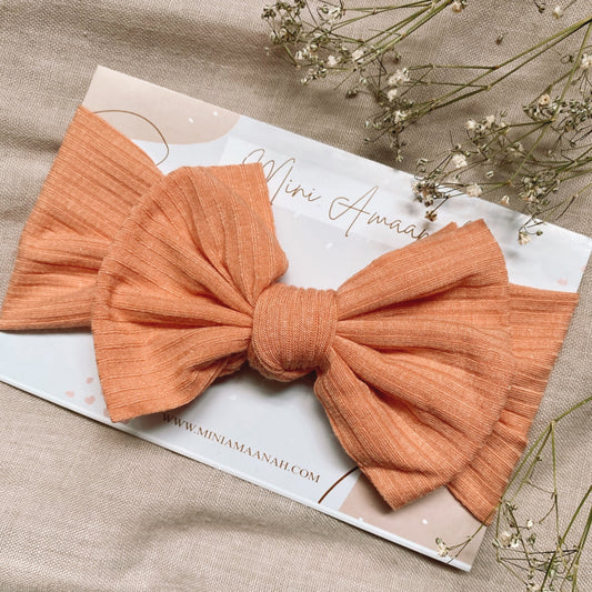 RIBBED CORAL KNOT BOW